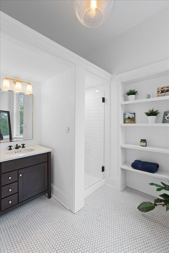 1313 N Wood St Unit 2, Chicago, IL 60622 - bathroom featuring vanity, a shower stall, and baseboards