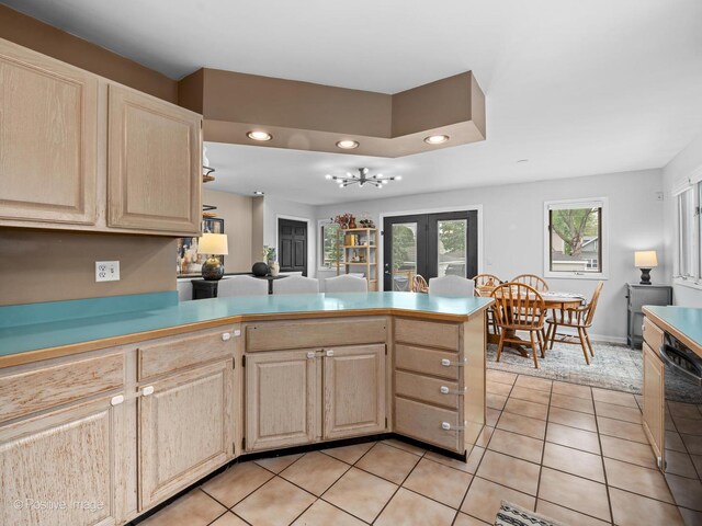 6085 N Nassau Ave, Chicago, IL 60631 - kitchen featuring light brown cabinetry, dishwasher, light tile patterned floors, recessed lighting, and a peninsula