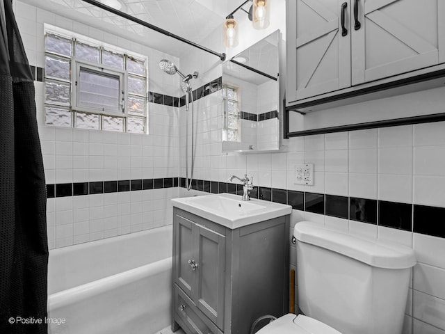 6085 N Nassau Ave, Chicago, IL 60631 - full bath with tile walls, shower / bathtub combination with curtain, toilet, vanity, and backsplash