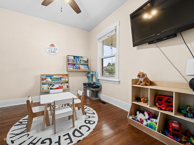 6085 N Nassau Ave, Chicago, IL 60631 - game room with baseboards, wood finished floors, and ceiling fan