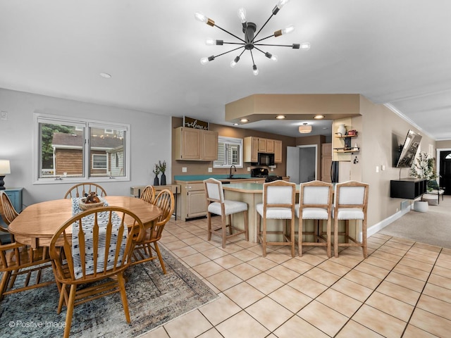 6085 N Nassau Ave, Chicago, IL 60631 - dining area featuring a chandelier, light tile patterned floors, and baseboards
