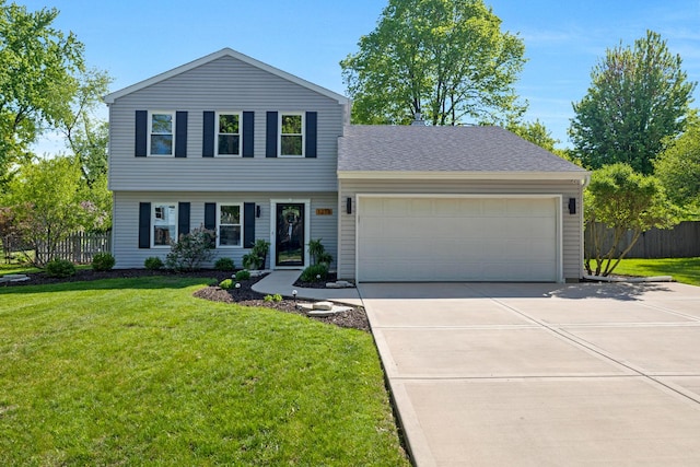 view of front of home with a garage, driveway, and a shingled roof