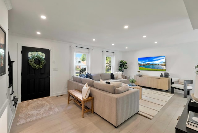 living room featuring recessed lighting and light wood-type flooring