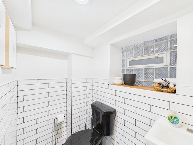 4810 W Strong St, Chicago, IL 60630 - bathroom featuring tile walls and a sink