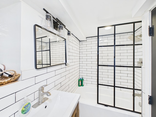 4810 W Strong St, Chicago, IL 60630 - full bath featuring tile walls, combined bath / shower with glass door, and a sink