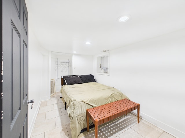 4810 W Strong St, Chicago, IL 60630 - bedroom with recessed lighting, baseboards, and light tile patterned floors