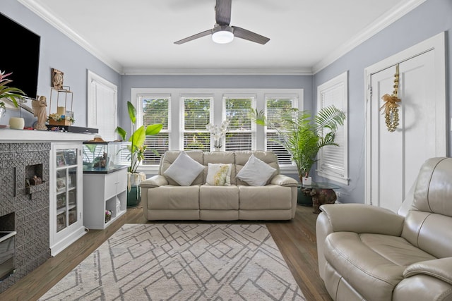 2018 N Laporte Ave, Chicago, IL 60639 - living room featuring ceiling fan, ornamental molding, and dark wood-type flooring