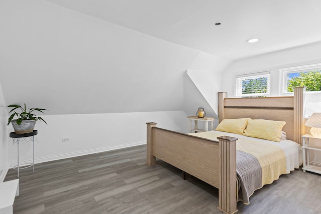 2018 N Laporte Ave, Chicago, IL 60639 - bedroom featuring wood finished floors, recessed lighting, and vaulted ceiling