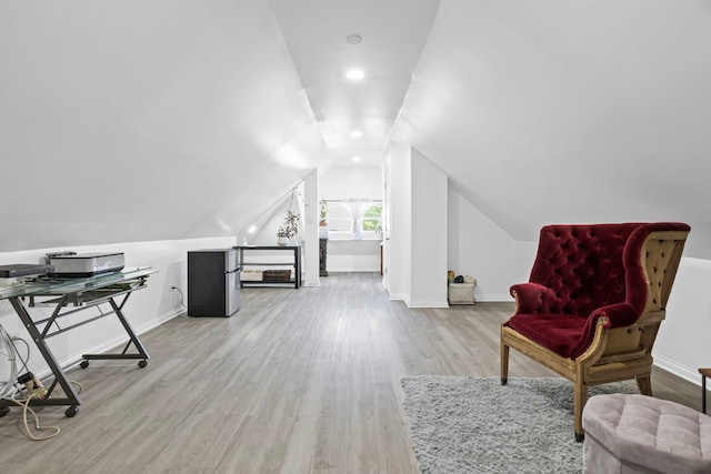 2018 N Laporte Ave, Chicago, IL 60639 - sitting room featuring wood finished floors, baseboards, and vaulted ceiling