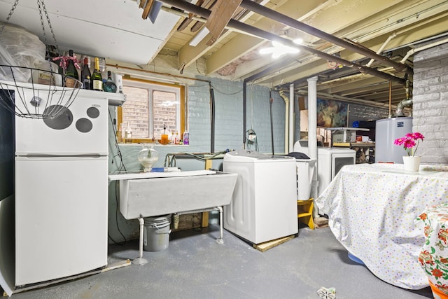 2018 N Laporte Ave, Chicago, IL 60639 - basement with freestanding refrigerator, gas water heater, independent washer and dryer, and a sink