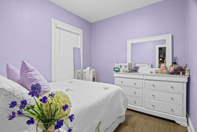2018 N Laporte Ave, Chicago, IL 60639 - bedroom featuring dark wood-style floors and baseboards