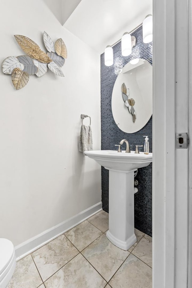 576 Aspen Dr, Lombard, IL 60148 - half bath with tile patterned floors, baseboards, and toilet
