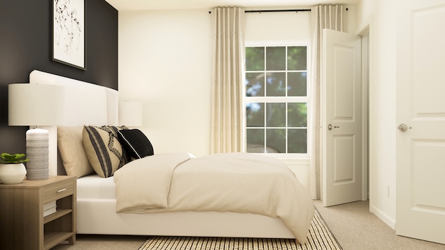 bedroom featuring light colored carpet