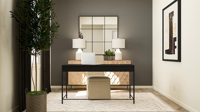 office with wood finished floors and baseboards