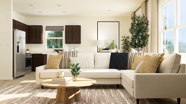 living room with plenty of natural light and recessed lighting