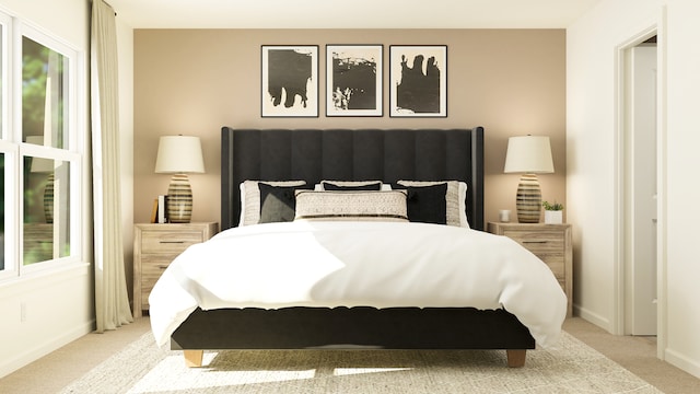 bedroom with light carpet, baseboards, and multiple windows