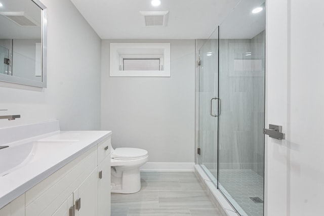7306 W Pensacola Ave, Norridge, IL 60706 - full bathroom featuring a stall shower, toilet, baseboards, vanity, and recessed lighting