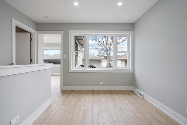 7306 W Pensacola Ave, Norridge, IL 60706 - unfurnished room featuring light wood-style flooring, healthy amount of natural light, recessed lighting, and baseboards