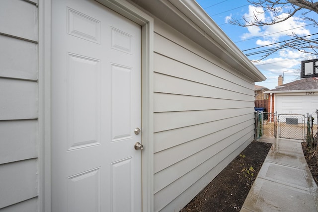 7306 W Pensacola Ave, Norridge, IL 60706 - property entrance with fence and a gate