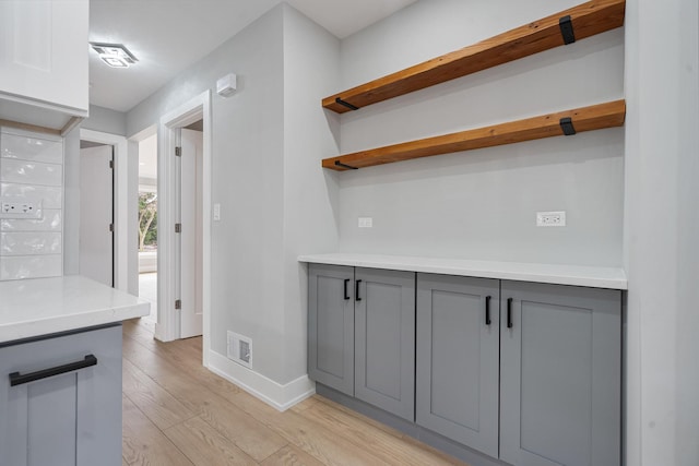 7306 W Pensacola Ave, Norridge, IL 60706 - bar featuring light wood-style flooring and baseboards