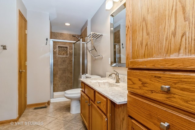20827 W Torrey Pines Ln, Plainfield, IL 60544 - bathroom with vanity, toilet, tile patterned floors, a stall shower, and recessed lighting