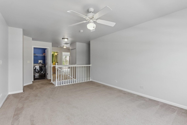 2007 S Kristina Ln, Round Lake, IL 60073 - carpeted spare room featuring washer / clothes dryer, baseboards, and a ceiling fan