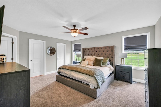 7 Connor Ct, Monticello, IL 61856 - bedroom featuring light colored carpet, baseboards, and ceiling fan