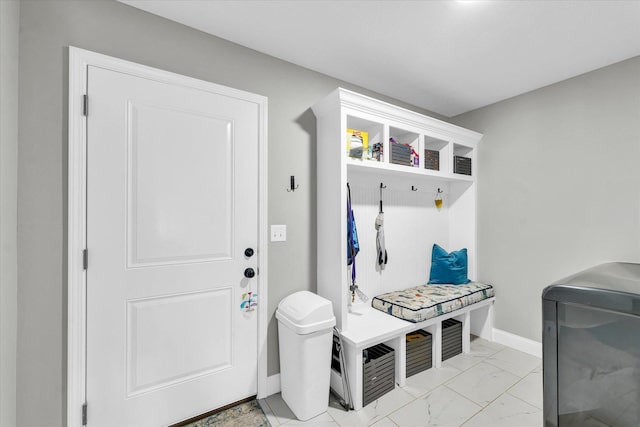7 Connor Ct, Monticello, IL 61856 - mudroom featuring light marble finish floors and baseboards