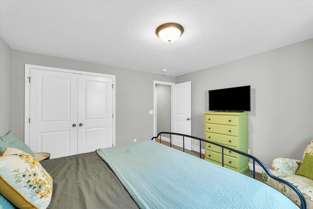 7 Connor Ct, Monticello, IL 61856 - carpeted bedroom featuring a closet and baseboards