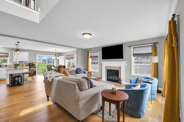 7 Connor Ct, Monticello, IL 61856 - living area with light wood finished floors and a fireplace