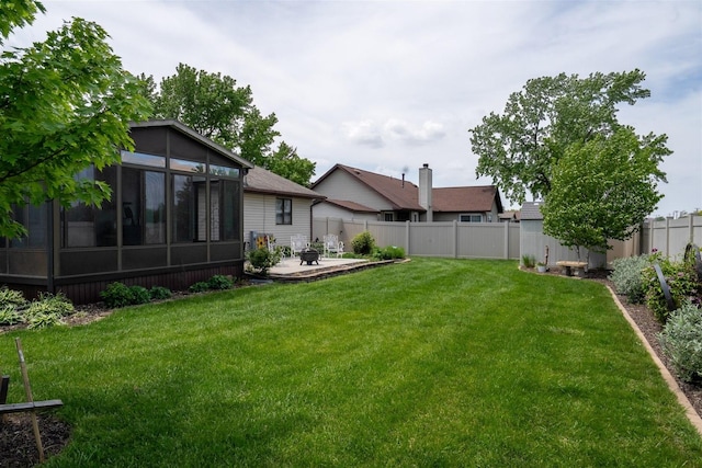1401 Bethany Ln, Pontiac, IL 61764 - view of yard featuring a sunroom and a patio