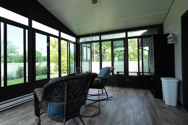 1401 Bethany Ln, Pontiac, IL 61764 - sunroom featuring healthy amount of natural light, vaulted ceiling, and a baseboard heating unit