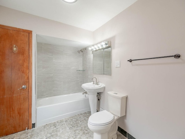 7300 S Talman Ave, Chicago, IL 60629 - bathroom featuring toilet, shower / washtub combination, and tile patterned flooring