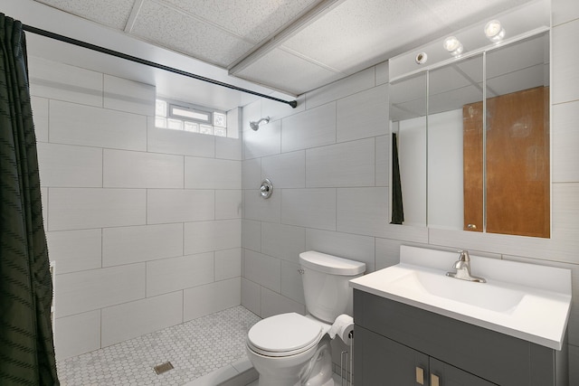3156 W 100th St, Evergreen Park, IL 60805 - bathroom with tiled shower, vanity, toilet, and tile walls
