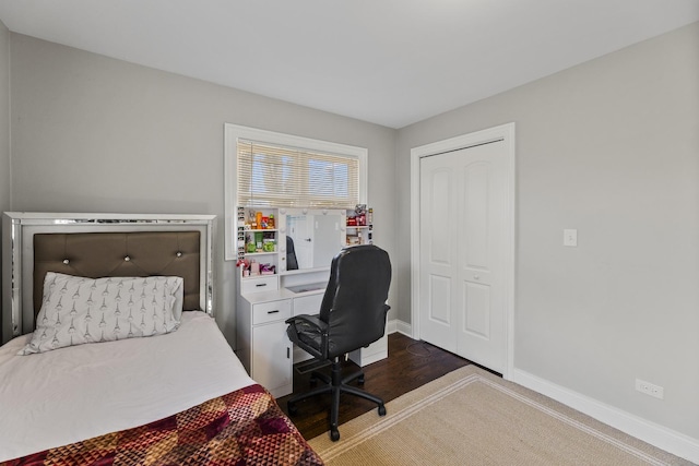 8320 Latrobe Ave, Burbank, IL 60459 - bedroom with baseboards, an office area, wood finished floors, and a closet