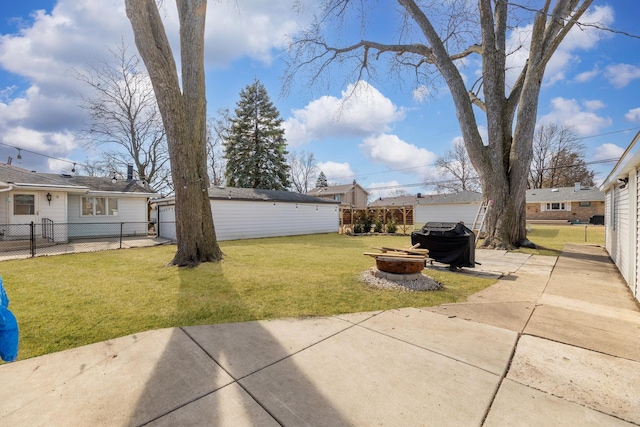 8320 Latrobe Ave, Burbank, IL 60459 - view of yard featuring an outdoor fire pit, a garage, and a patio area