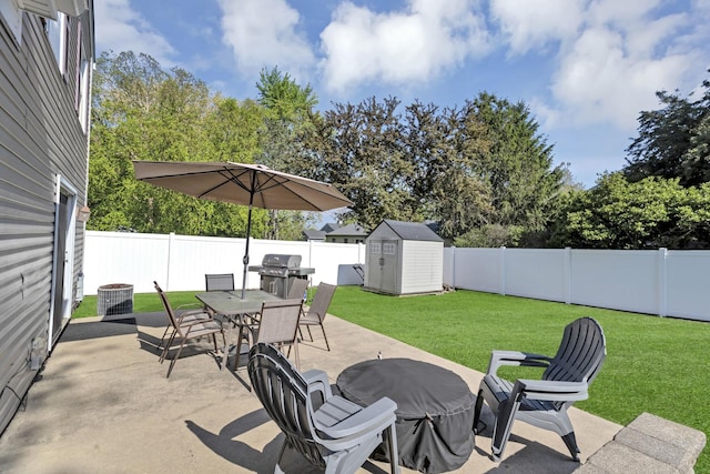 view of patio with outdoor dining space, a storage unit, an outbuilding, and central air condition unit