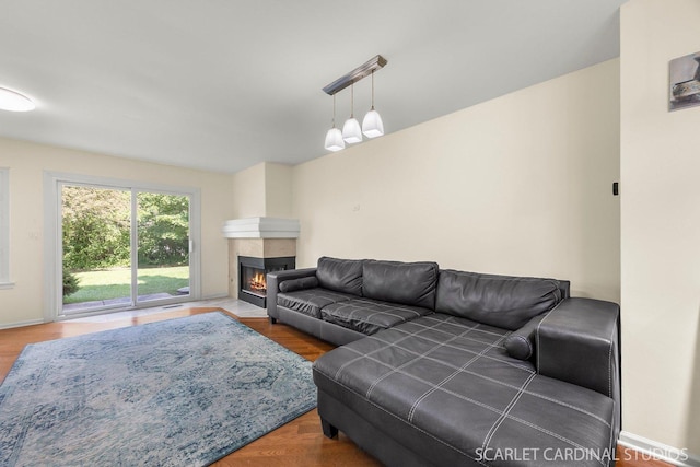 105 Concord Ln, Carol Stream, IL 60188 - living area featuring a tiled fireplace and wood finished floors