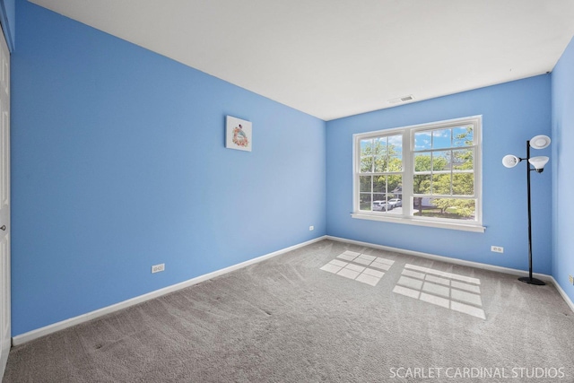 105 Concord Ln, Carol Stream, IL 60188 - spare room with baseboards and carpet