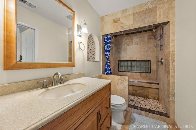 105 Concord Ln, Carol Stream, IL 60188 - full bathroom featuring a tile shower, toilet, and vanity