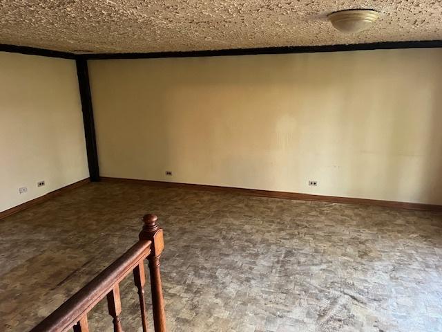 7239 W 110th St, Worth, IL 60482 - spare room with baseboards