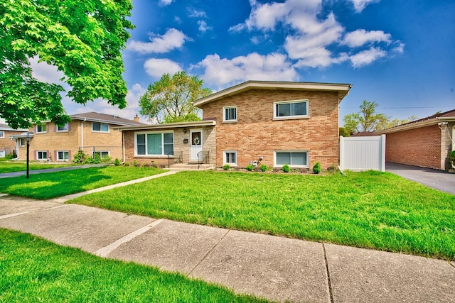 7906 Churchill St, Morton Grove, IL 60053 - split level home featuring brick siding