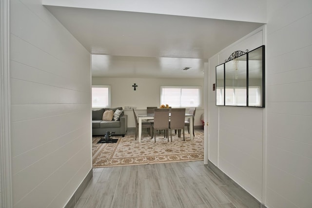 7906 Churchill St, Morton Grove, IL 60053 - dining area with wood finished floors, healthy amount of natural light, and baseboards