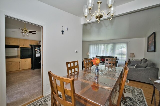 7906 Churchill St, Morton Grove, IL 60053 - dining area featuring a ceiling fan, a chandelier, and light wood-style floors