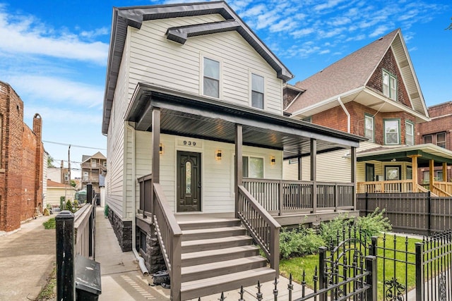 939 N Massasoit Ave, Chicago, IL 60651 - view of front facade featuring a porch