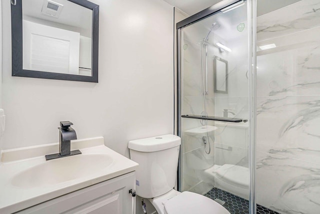 939 N Massasoit Ave, Chicago, IL 60651 - full bathroom with toilet, a marble finish shower, and vanity