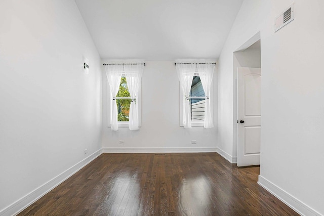 939 N Massasoit Ave, Chicago, IL 60651 - unfurnished room with hardwood / wood-style flooring, baseboards, and vaulted ceiling