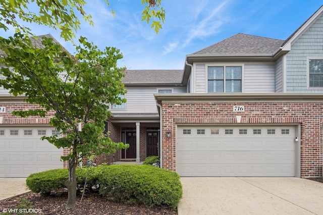 716 Kingsbrook Gln, Glen Ellyn, IL 60137 - traditional-style house featuring concrete driveway, brick siding, a garage, and a shingled roof
