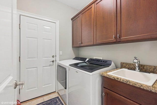 716 Kingsbrook Gln, Glen Ellyn, IL 60137 - washroom featuring washer and clothes dryer, cabinet space, and light tile patterned floors