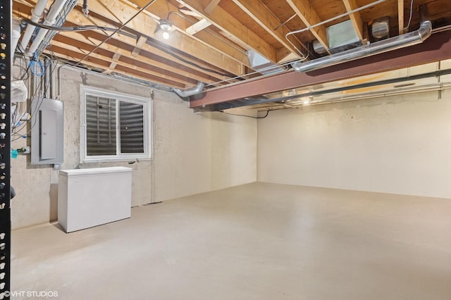 716 Kingsbrook Gln, Glen Ellyn, IL 60137 - unfinished below grade area featuring refrigerator and electric panel